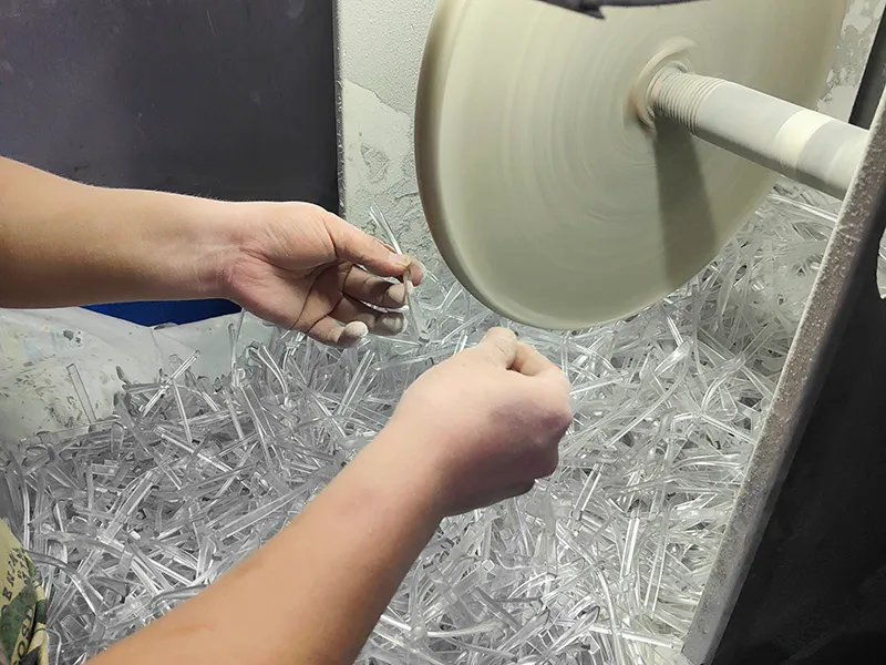 Hand polishing reading glasses frames — OEM eyewear production