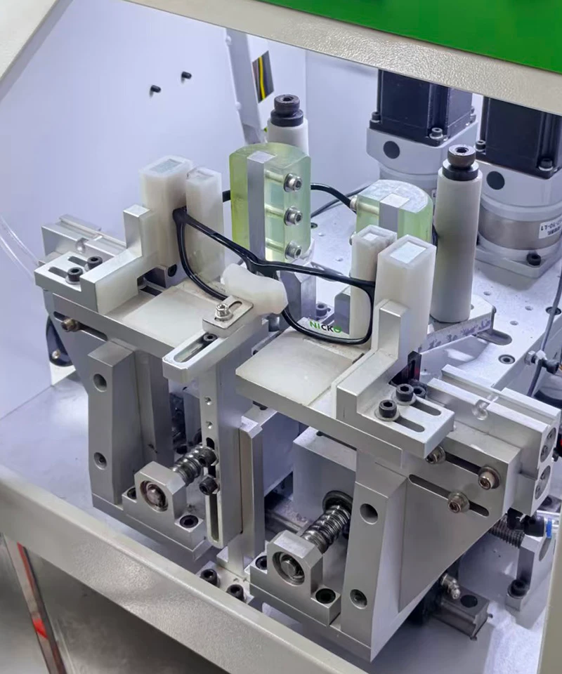 Acetate optical frame held in an automated precision jig for bridge and frame-front machining