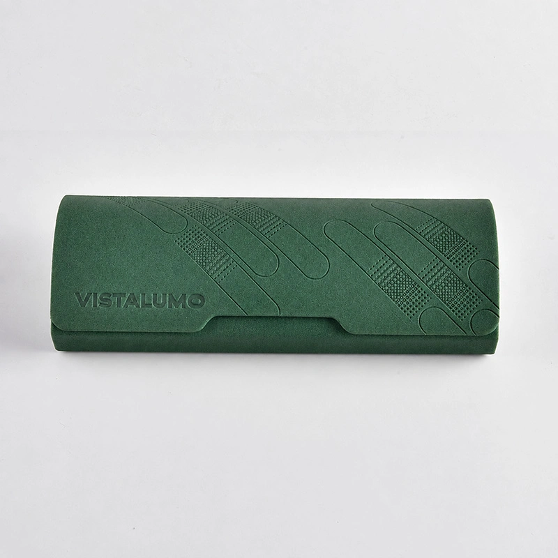 Dark green embossed folding eyeglass case, closed view