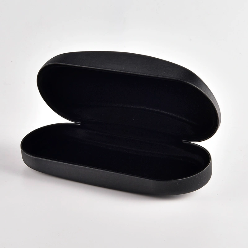 Black debossed case shown open with black flocked lining