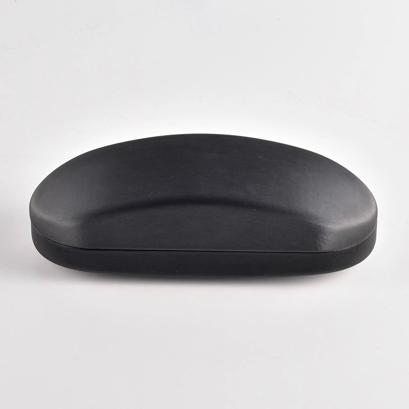 Matte black eyeglass case with debossed logo, closed view