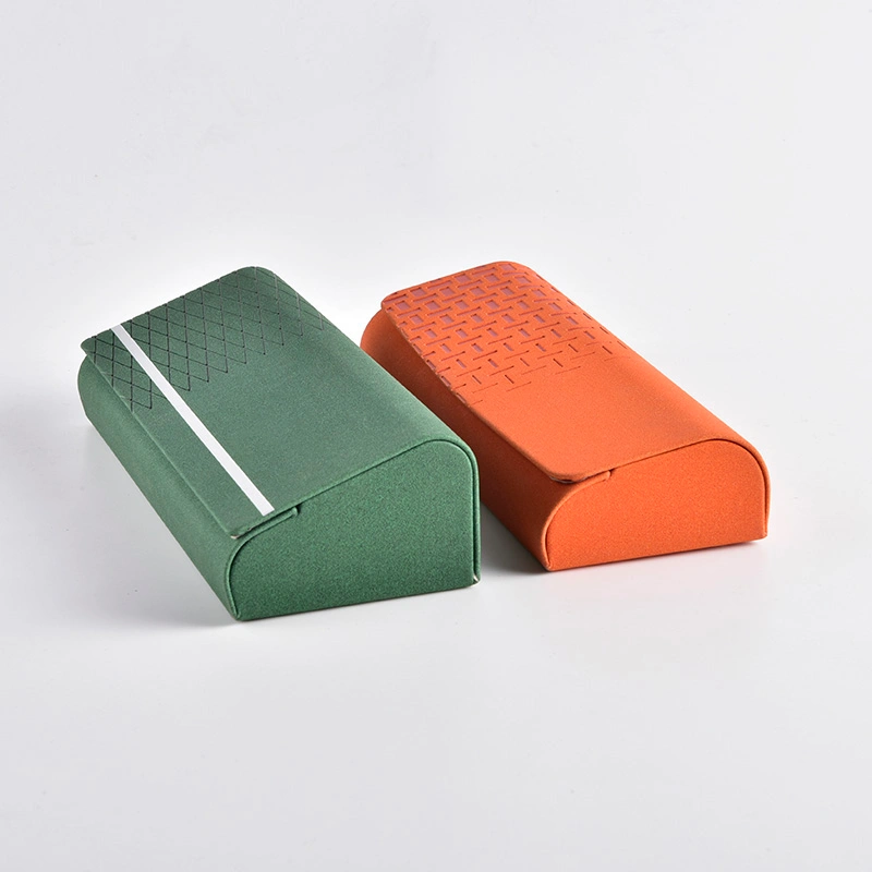Embossed PU folding cases standing upright showing textured surface