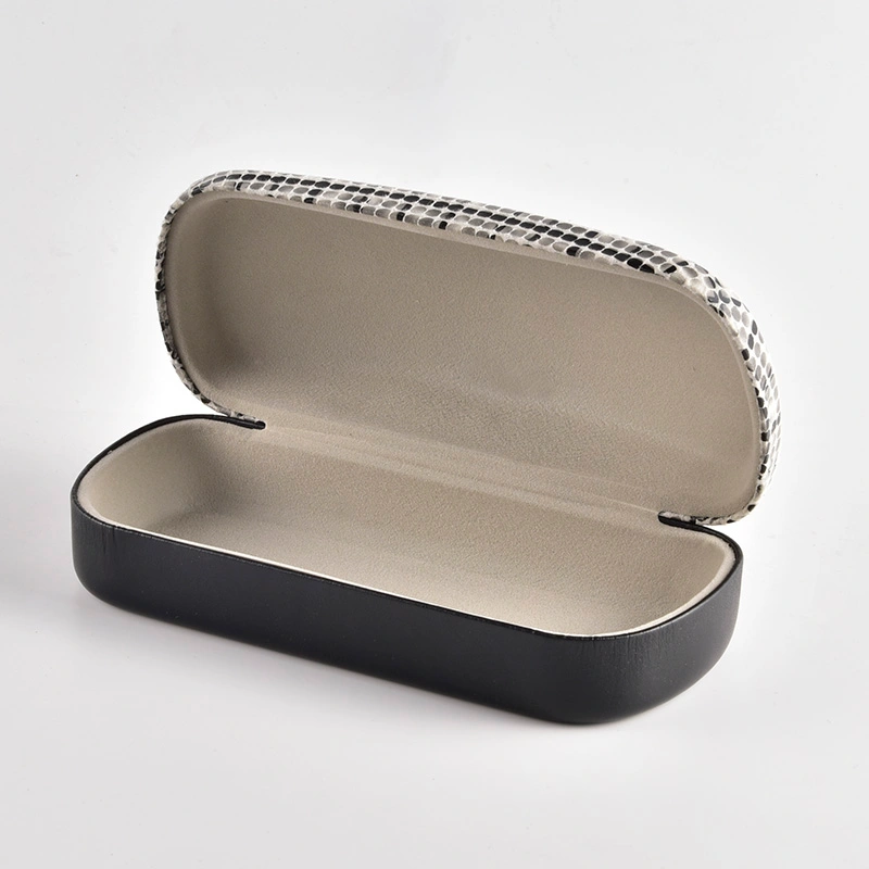 Dot pattern fabric case shown open with grey lining