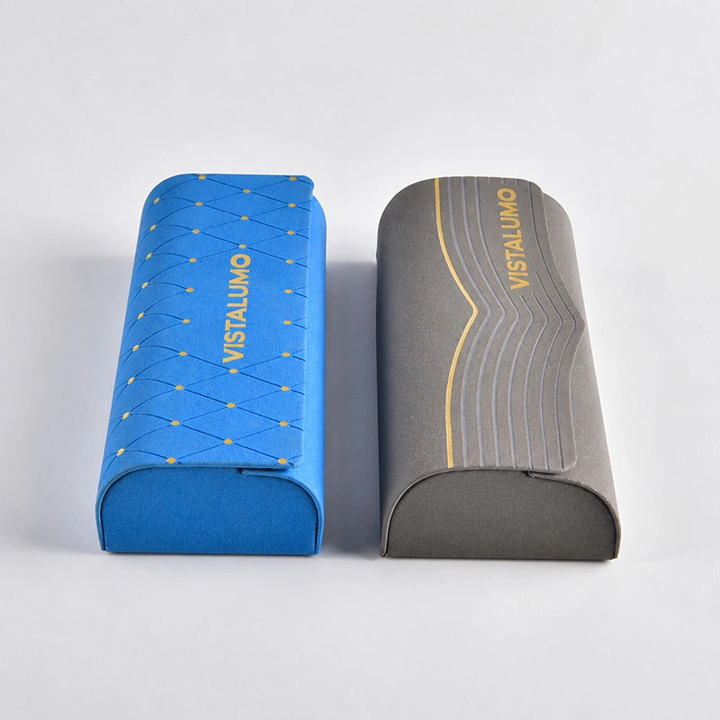 Foil stamped cases standing upright showing gold detailing