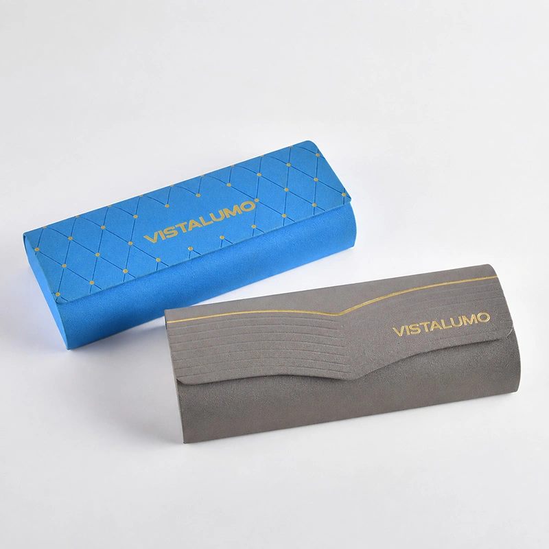 Blue and grey eyeglass cases with gold foil pattern, closed view