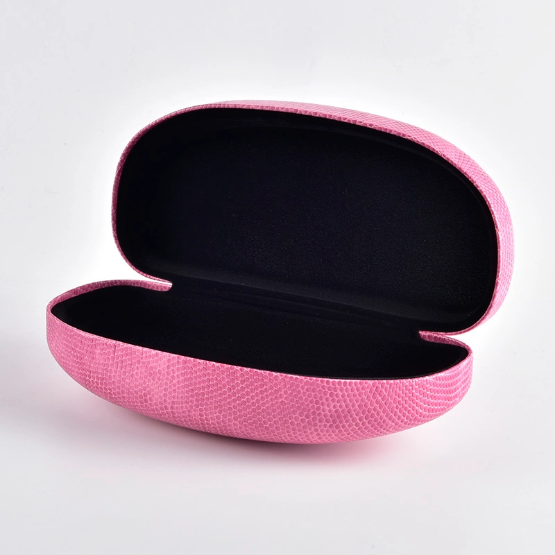 Pink oversized case shown open with black lining