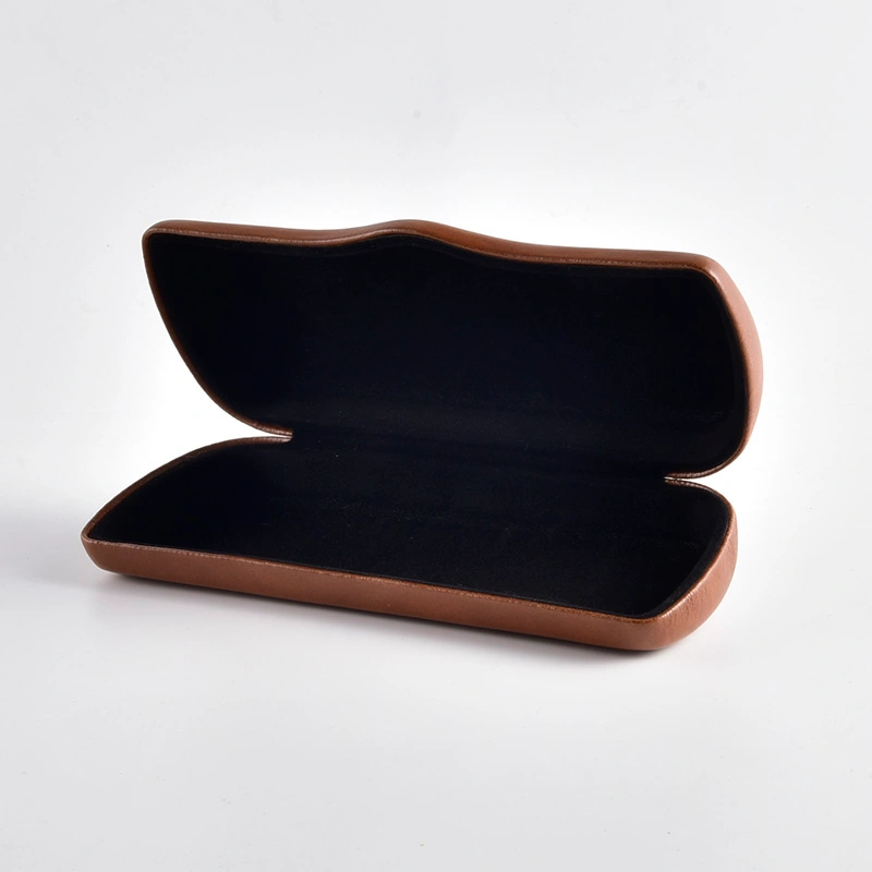 Brown PU case shown open with black flocked lining