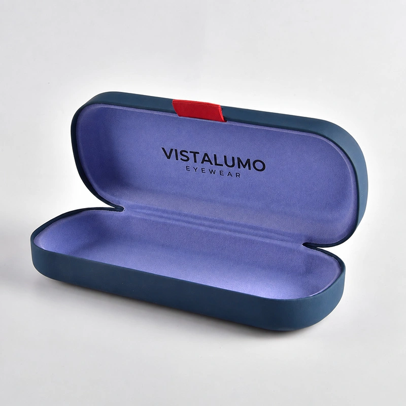 Navy case shown open with lavender flocked lining