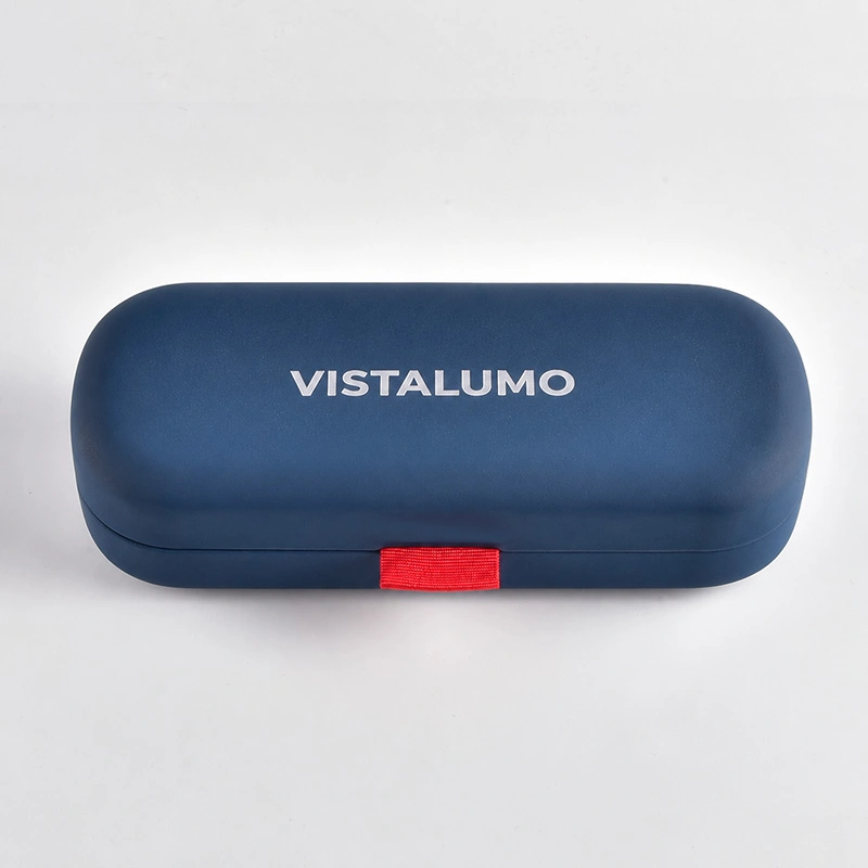 Navy soft touch eyeglass case with red pull tab, closed view