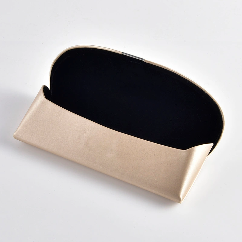 Champagne PU pouch shown open with black lining