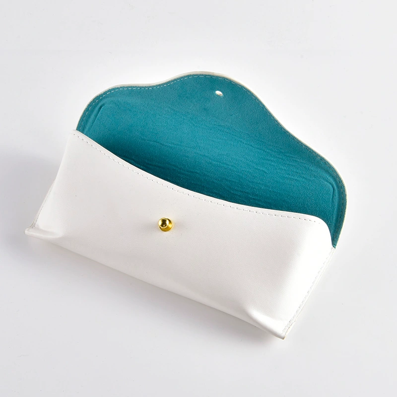 White PU pouch shown open revealing teal interior