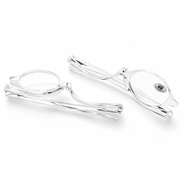Crystal clear makeup reading glasses with flip up single lens, angled view