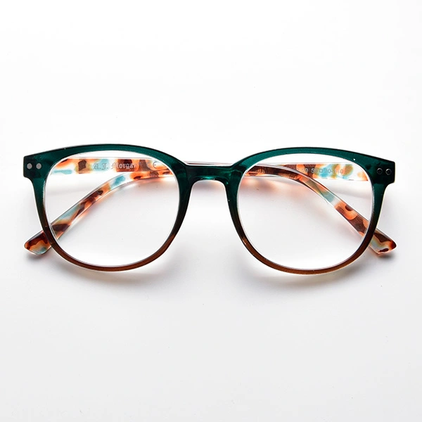 Front view of teal round reading glasses with patterned temples